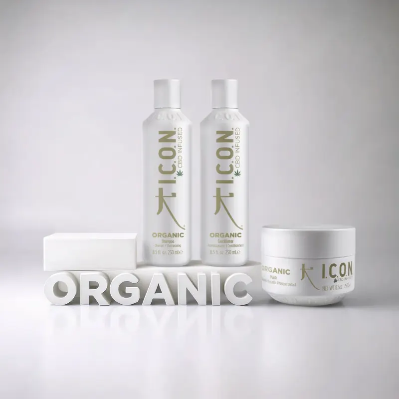 I.C.O.N. Organic CBD-infused shampoo, conditioner and mask on a white pedestal