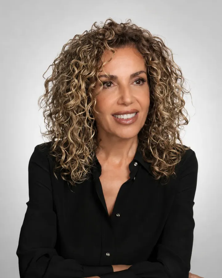 Portrait of Chiara Scudieri smiling in a black shirt