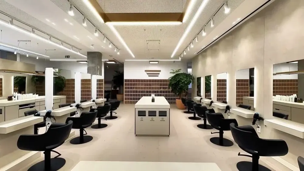 The salon floor of the House of I.C.O.N. in Vigo, styling stations and chairs