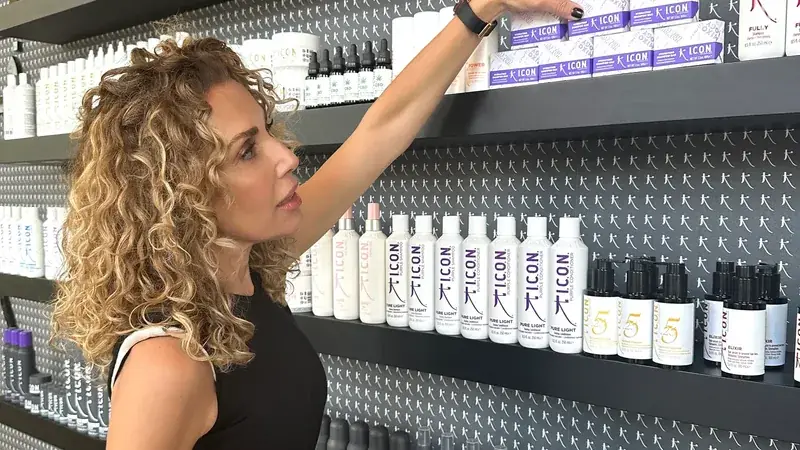Chiara Scudieri in front of I.C.O.N. shelves, Glamour interview